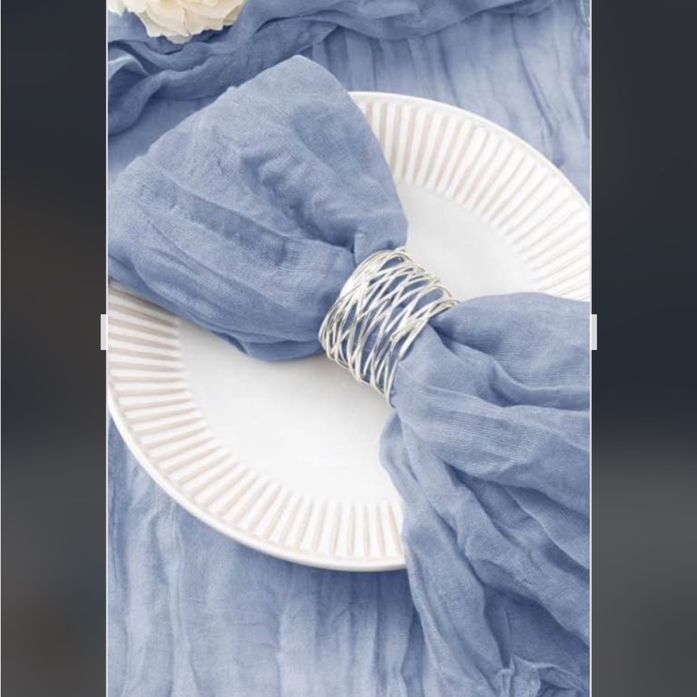 Elegant dusty blue cheesecloth napkins. No other accessories included.48